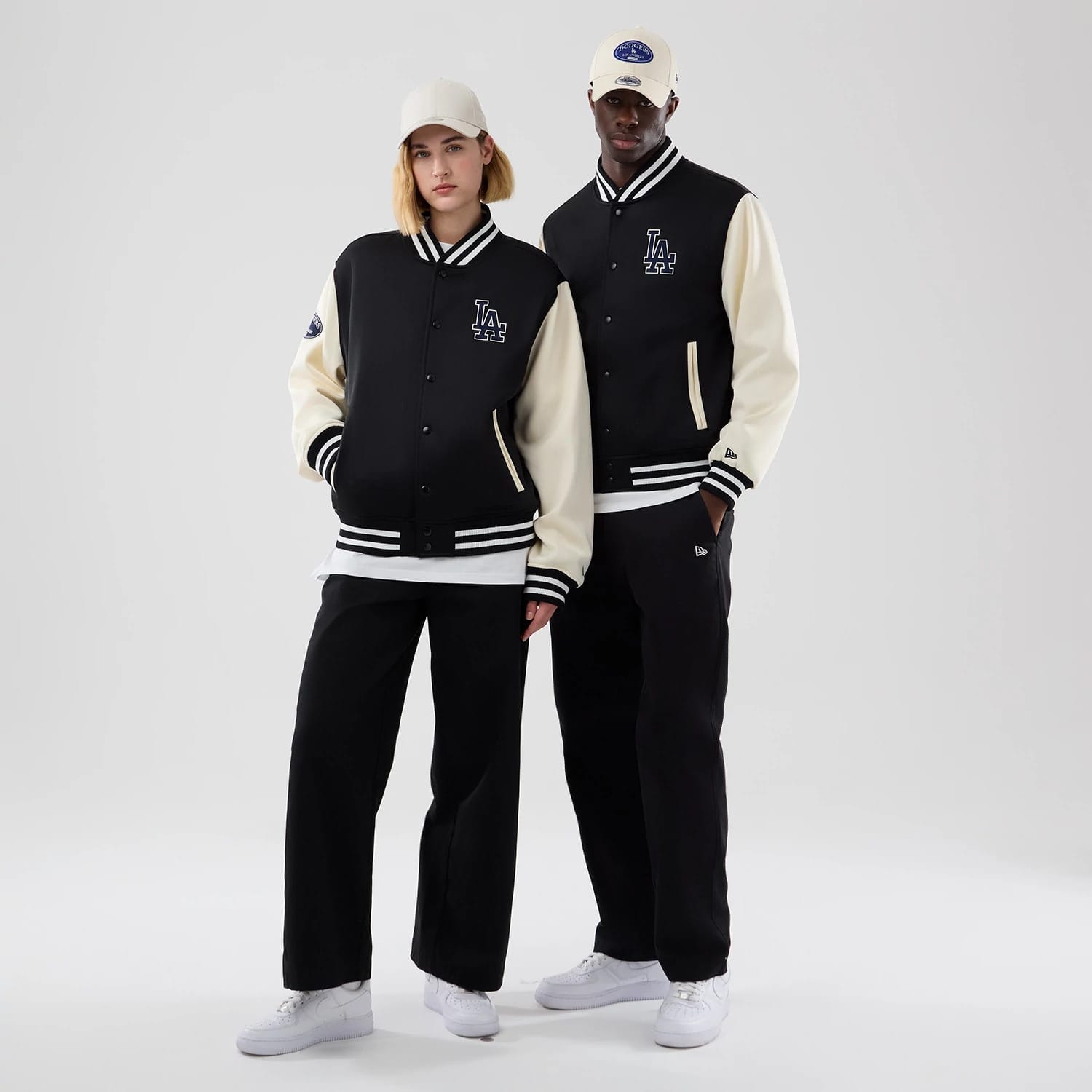 The model is wearing this MLB Jersey Bomber LA Dodgers Jacket in black. 1