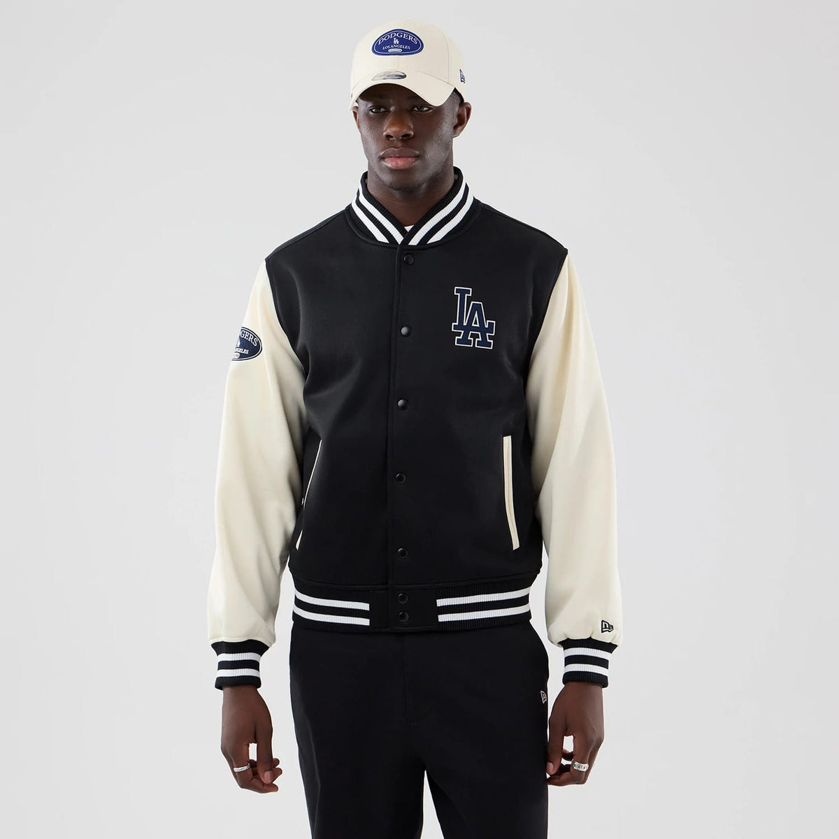 The model is wearing this MLB Jersey Bomber LA Dodgers Jacket in black. 3