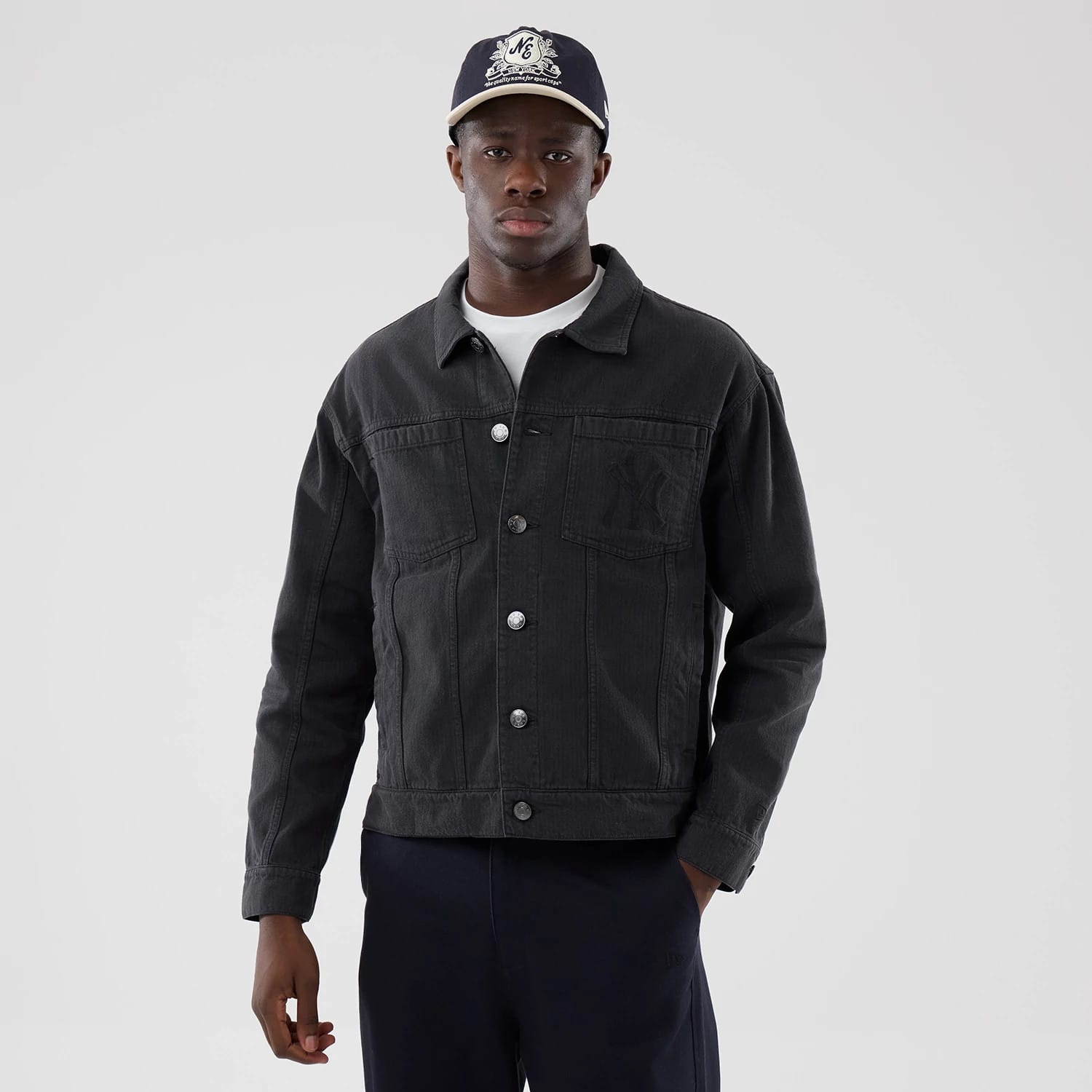 The model is wearing this MLB Stripe Denim New York Yankees Jacket in grey. 1