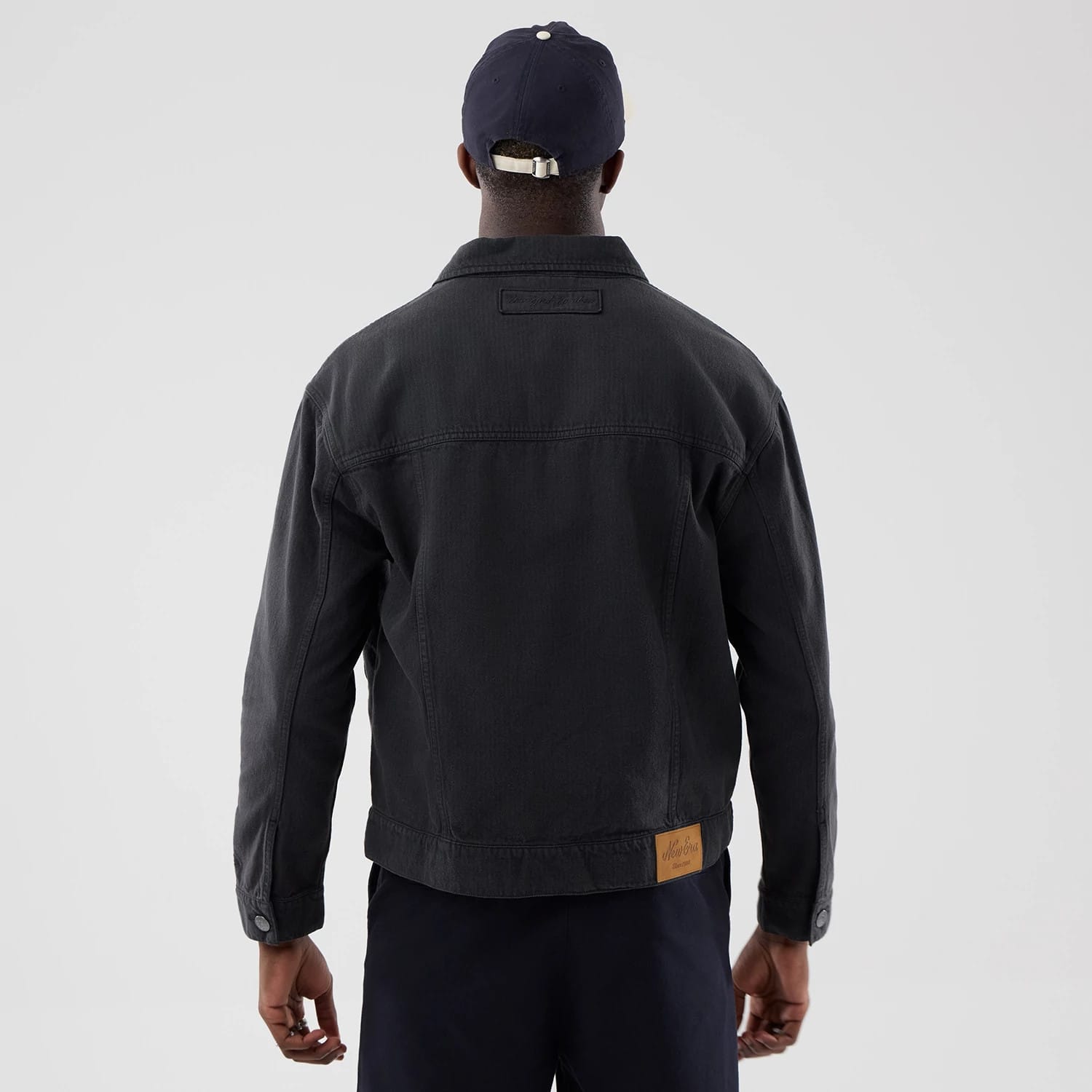 The model is wearing this MLB Stripe Denim New York Yankees Jacket in grey. 2