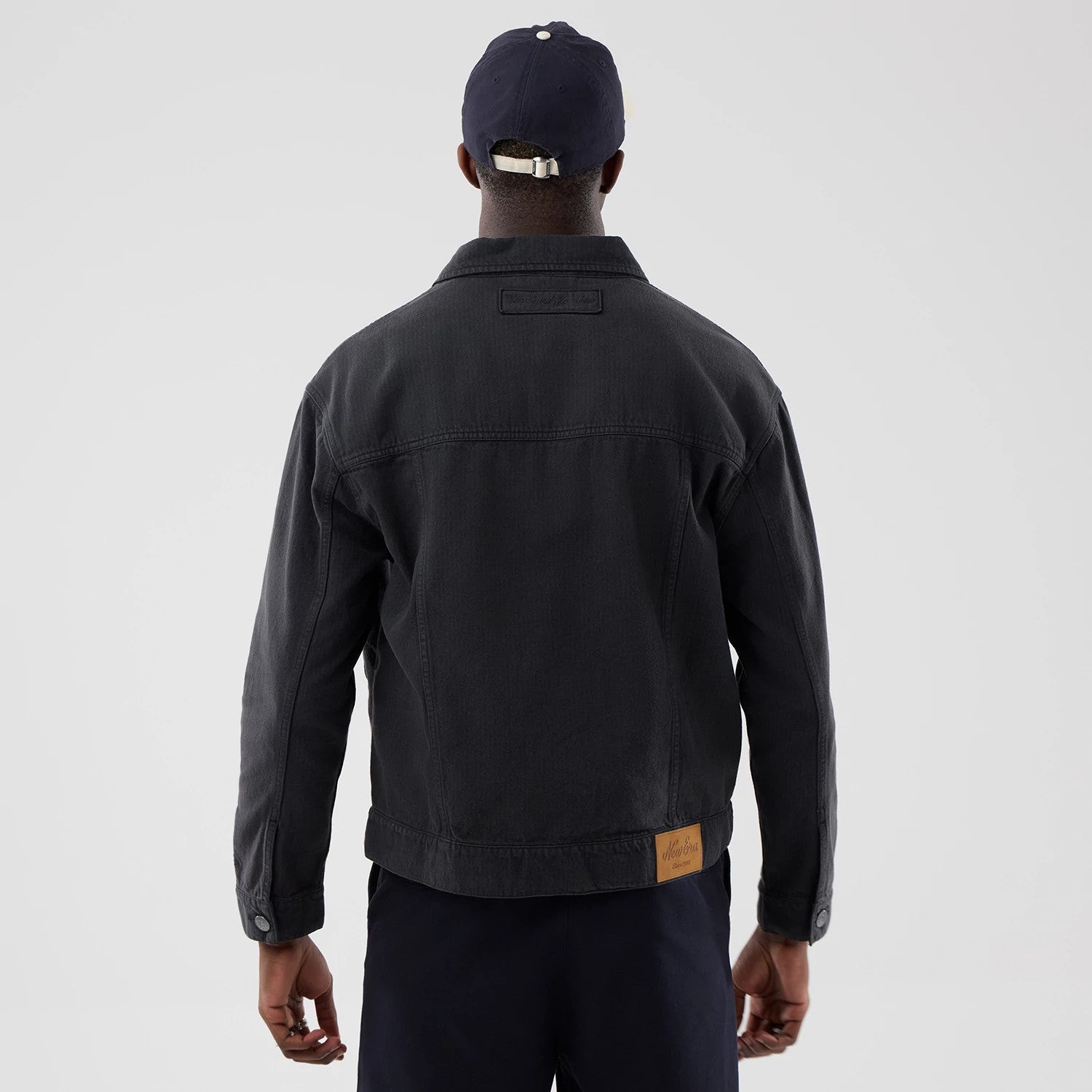 The model is wearing this MLB Stripe Denim New York Yankees Jacket in grey. 2