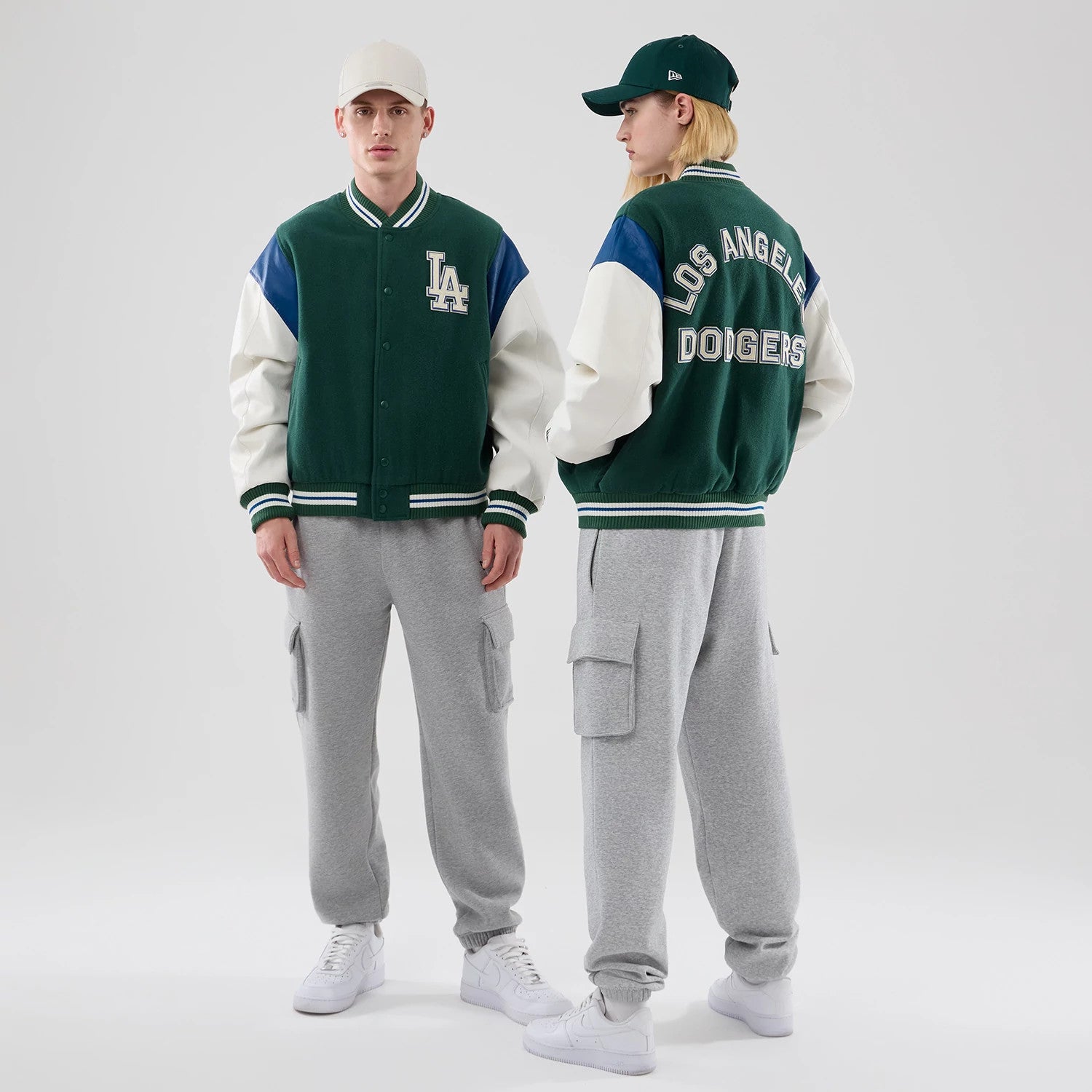 The model is wearing this MLB Varsity LA Dodgers Jacket in dark green. 1
