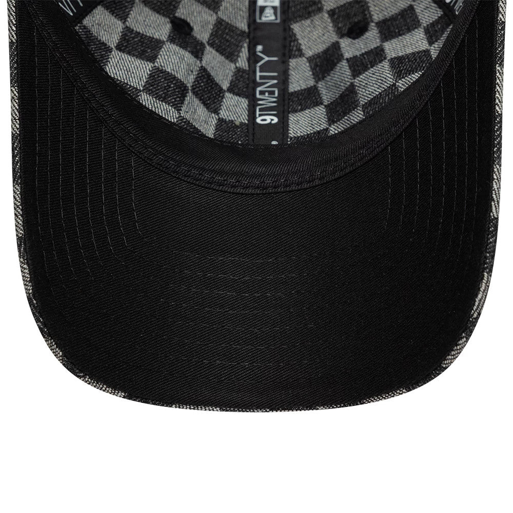 Ducati Motor All Over Print Black New Era 9TWENTY Adjustable Cap, inside view showing the black sweatband with New Era branding, black undervisor, and a distinctive chequered taping pattern lining the interior crown.