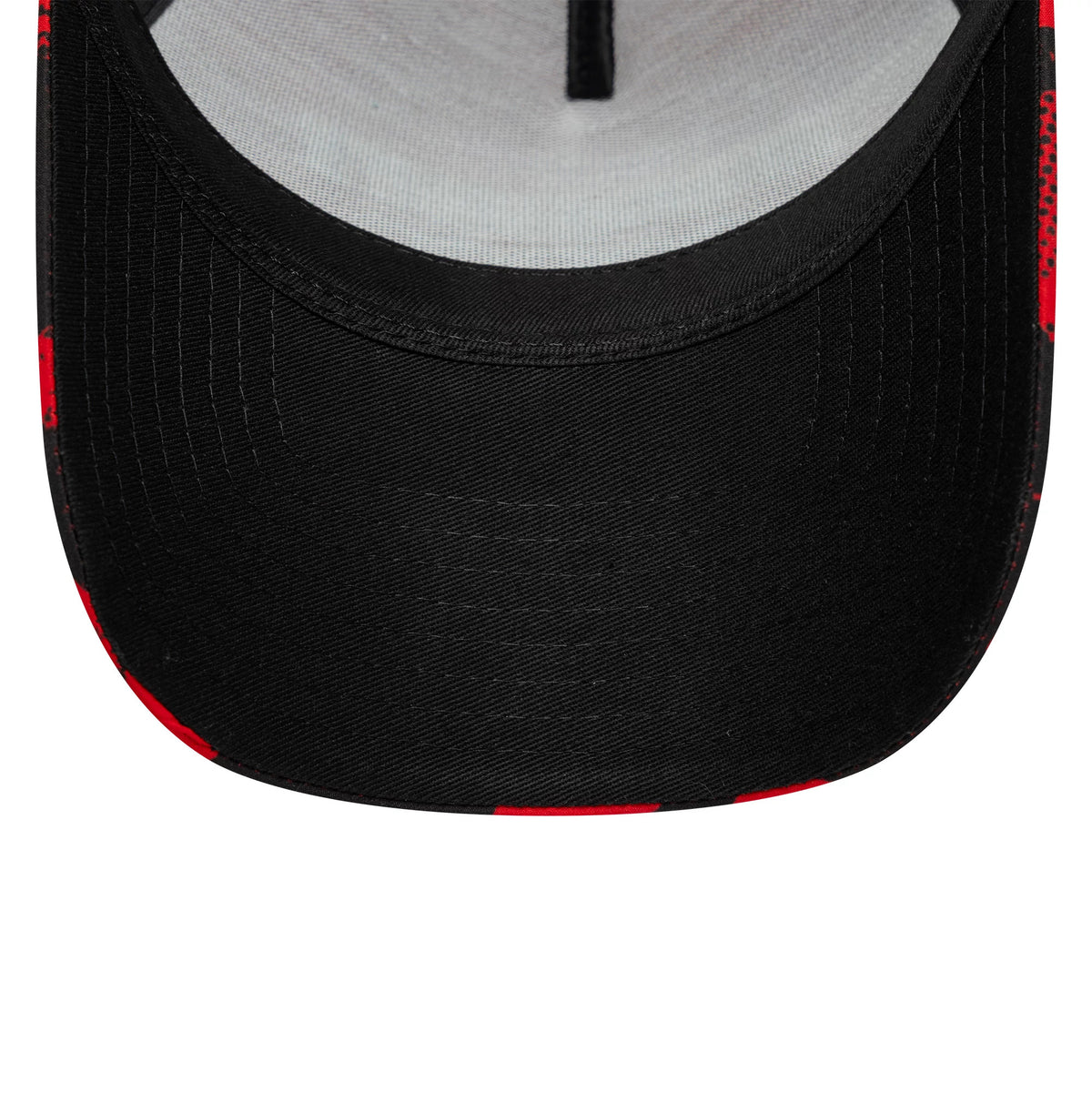 Ducati Motor Camo Black New Era 9FORTY E-Frame Trucker Adjustable Cap, inside view showing the grey undervisor with a black sweatband, contrasting red and black pattern on the edge of the visor, and a vertical black seam tape.