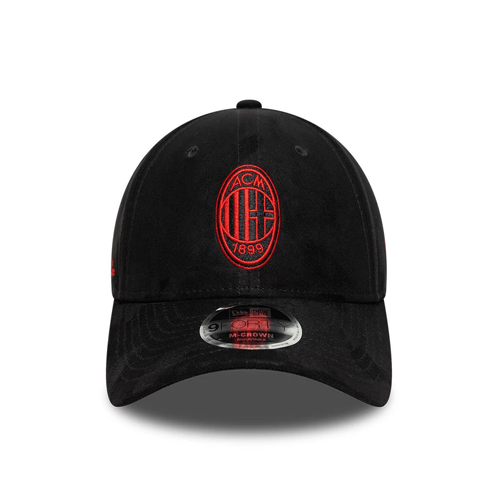 AC Milan Faux Suede Black New Era 9FORTY M-Crown Adjustable Cap, front view showing the red embroidered AC Milan crest logo on the structured black faux suede crown, with a grey 9FORTY size sticker on the black curved visor.