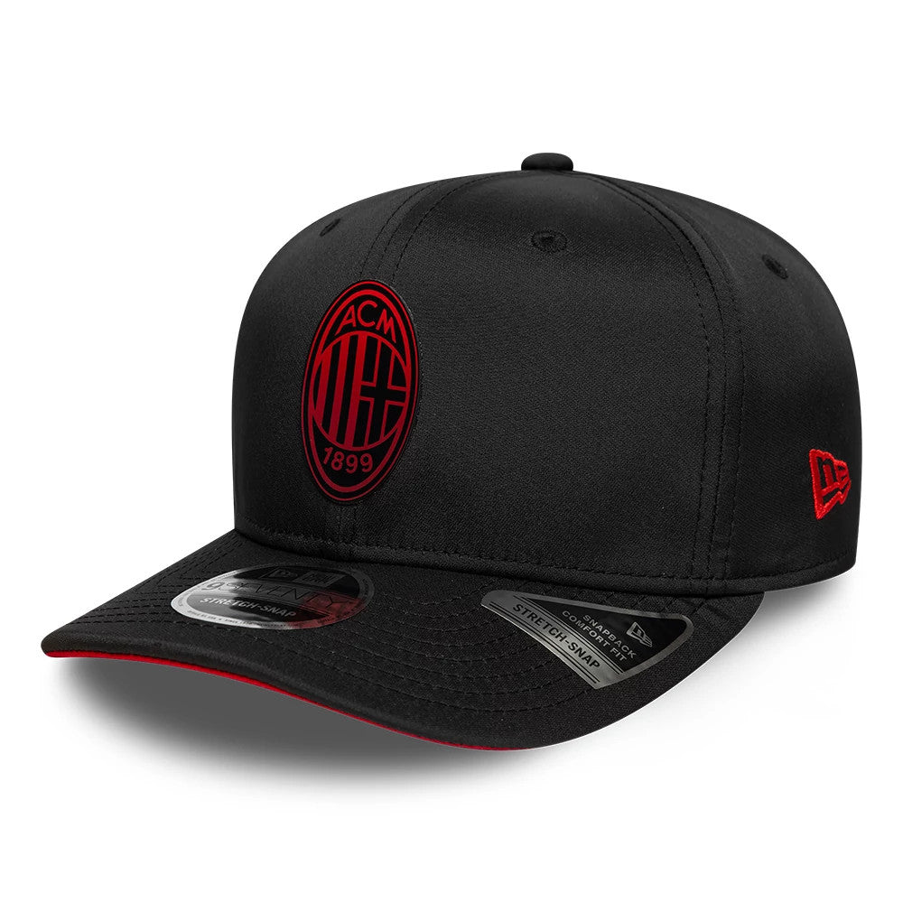 AC Milan Featherweight Poly Black New Era 9SEVENTY Stretch Snap Adjustable Cap, front view showing the red AC Milan logo embroidered on the black front panel, black curved visor with a 9SEVENTY size sticker.