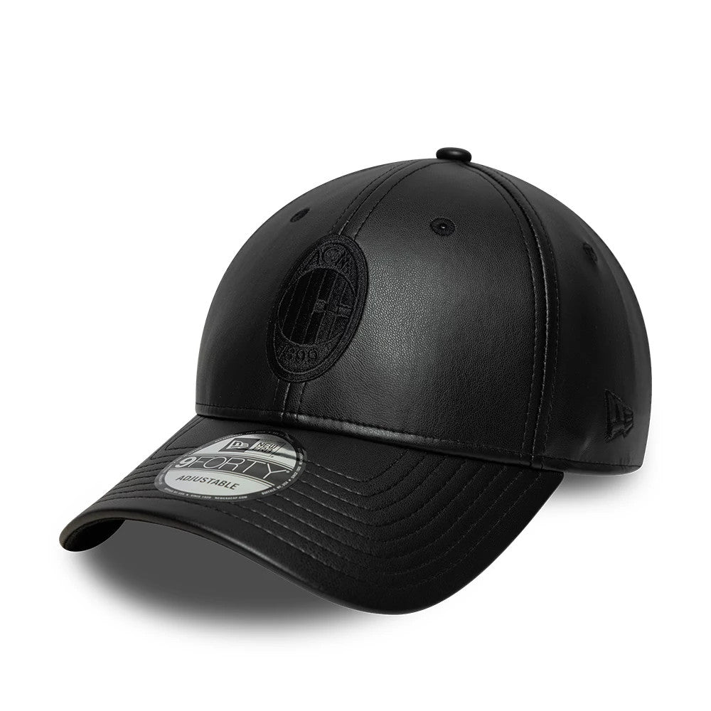 AC Milan PU Black New Era 9FORTY Adjustable Cap, three-quarter view showing the black embroidered AC Milan logo on the front panel, slightly curved black visor with a 9FORTY size sticker, and the New Era flag logo on the left side.