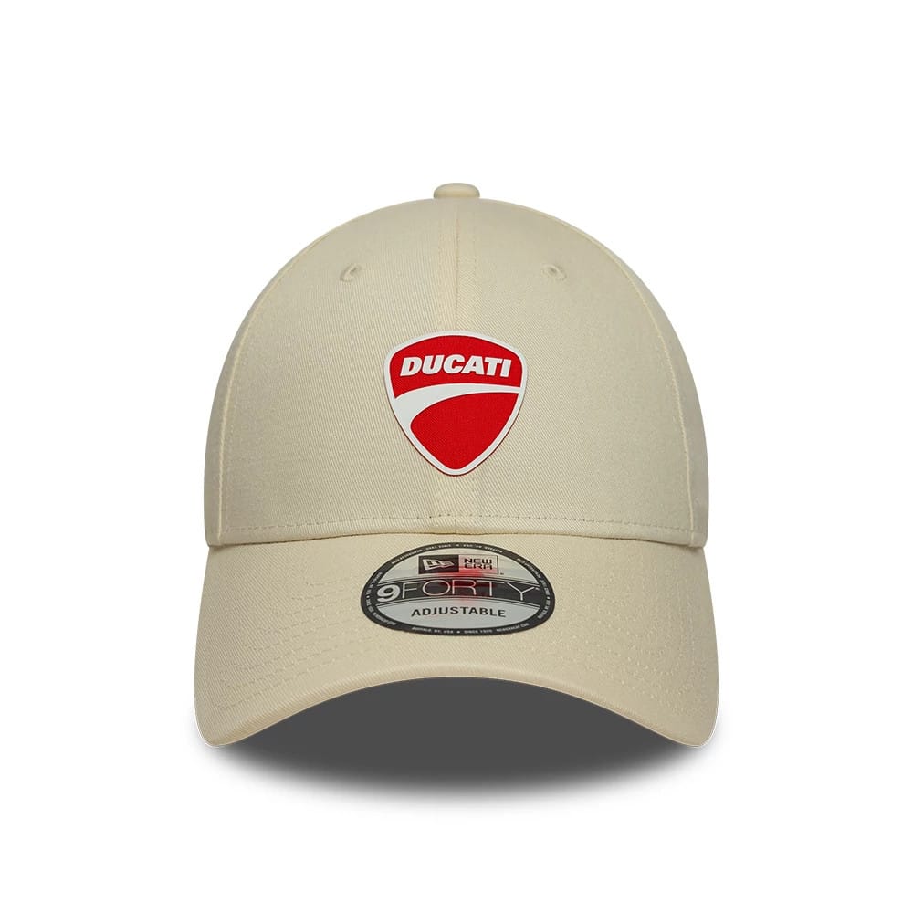 Ducati Motor Core Cream New Era 9FORTY Adjustable Cap, front view showing a red and white embroidered Ducati shield logo on the front panel, curved cream visor, and the black and silver 9FORTY size sticker on the visor.