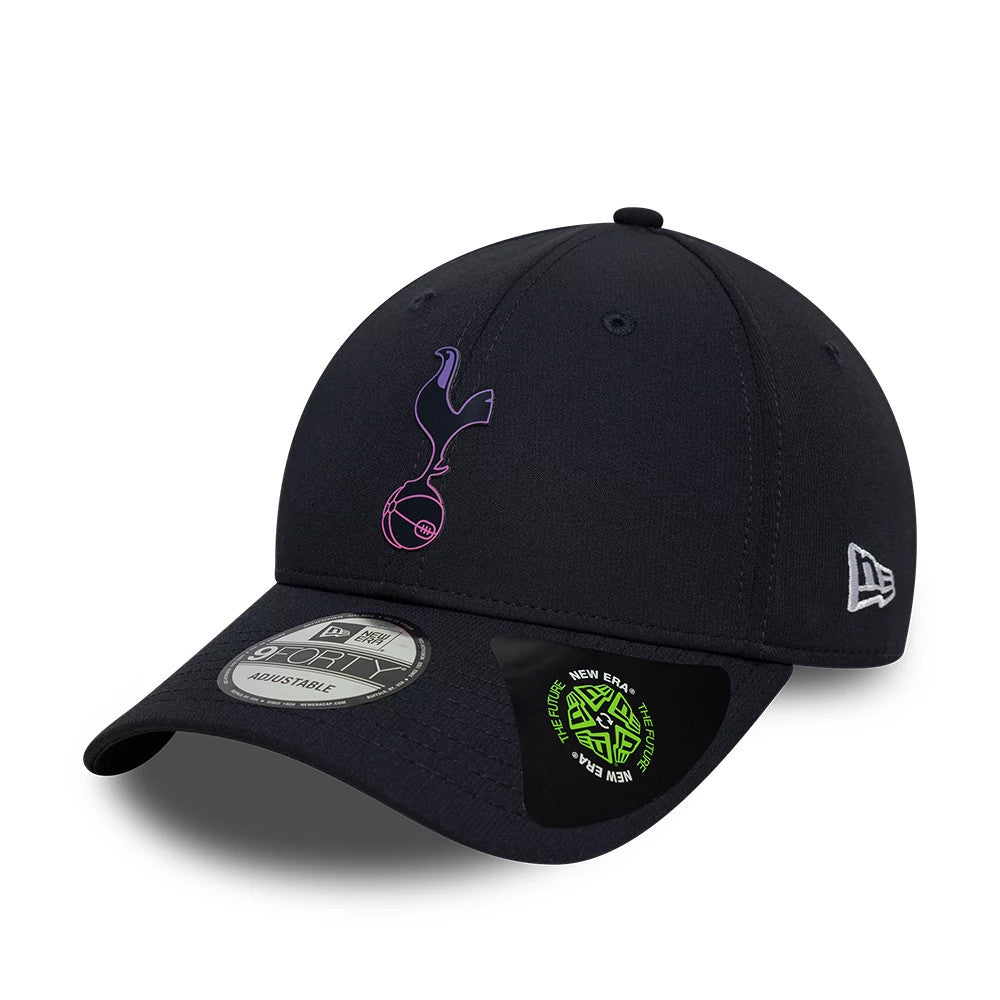Tottenham Hotspur FC Recycled Navy New Era 9FORTY Adjustable Cap, three-quarter view showing a pink and purple club crest on the front panel, a curved visor with a 9FORTY size sticker, and the New Era flag logo on the left side.