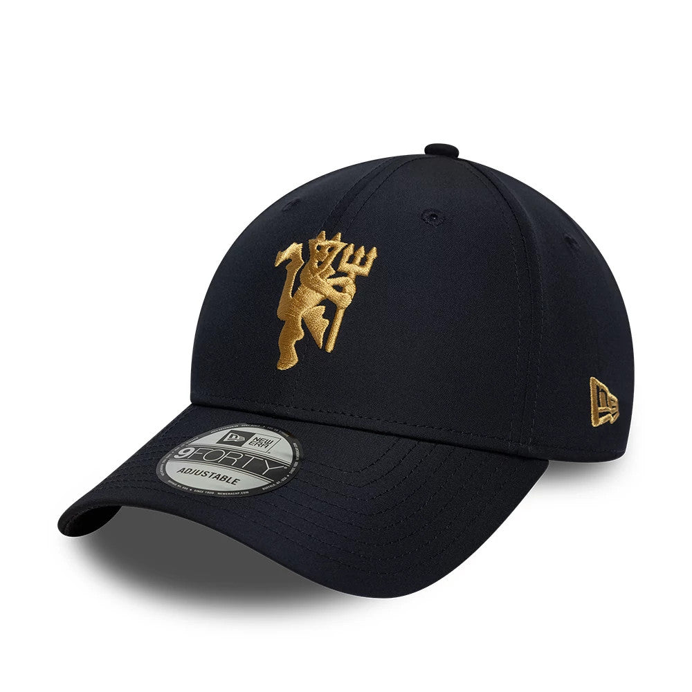 Pictured is this Manchester United FC Gold 9FORTY cap in navy. 1