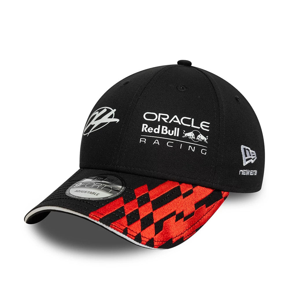 Red Bull Racing Visor Graphic Black New Era 9FORTY Adjustable Cap, front view showing white embroidered Red Bull Racing logo on the structured black crown and a distinctive red and black graphic pattern on the curved visor with a 9FORTY size sticker.
