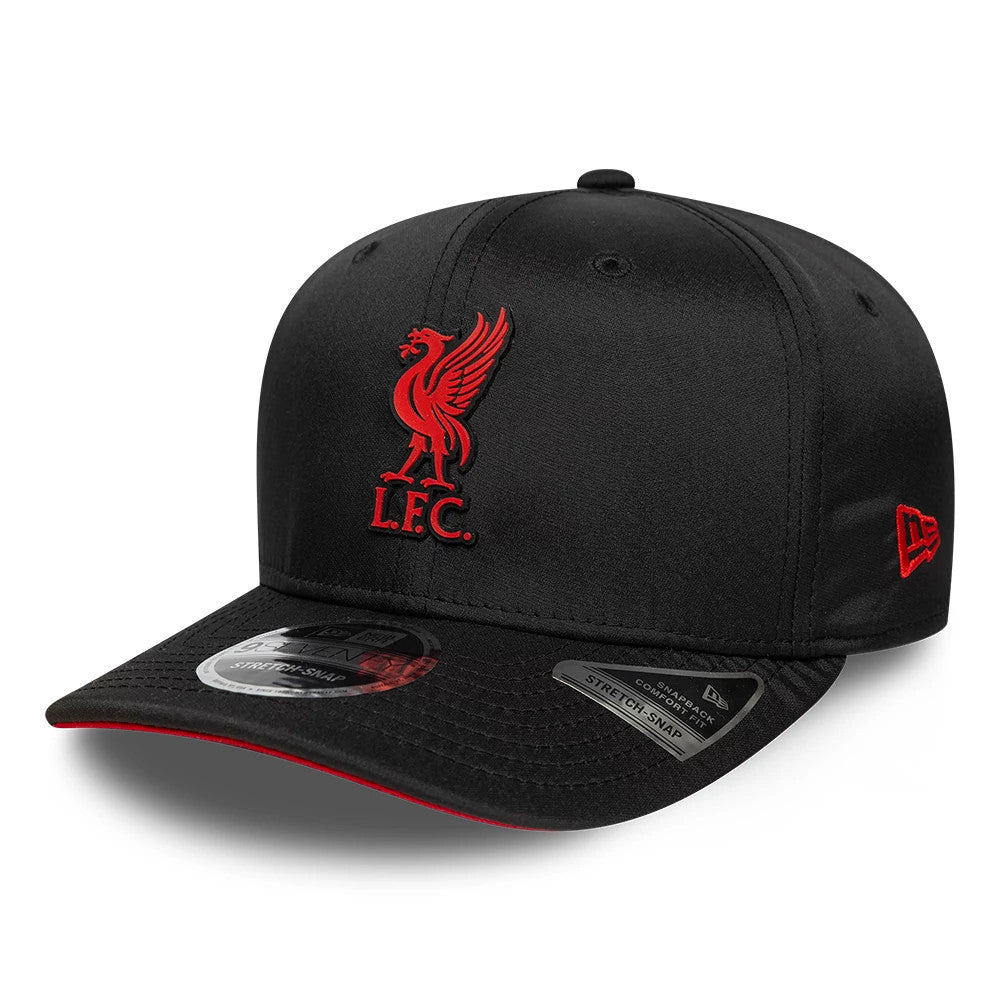 Liverpool FC Gradient Black New Era 9SEVENTY Stretch Snap Adjustable Cap, front view showing the red raised embroidery of the Liverbird logo and L.F.C. initials on the front panel, with a black visor featuring a 9SEVENTY size sticker.