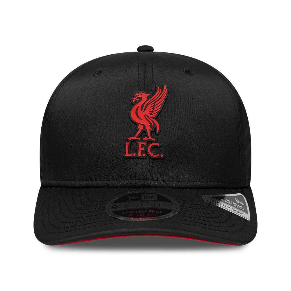 Liverpool FC Gradient Black New Era 9SEVENTY Stretch Snap Adjustable Cap, front view showing the red embroidered L.F.C. Liverbird logo on the structured black crown, black visor with a red edge, and black 9SEVENTY size sticker on the visor.