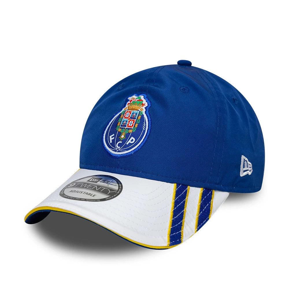 FC Porto 03 Blue New Era 9TWENTY Adjustable Cap, front view showing the full-colour FC Porto crest embroidered on the structured blue crown, a white curved visor with blue and yellow stripe details, and a 9TWENTY size sticker.
