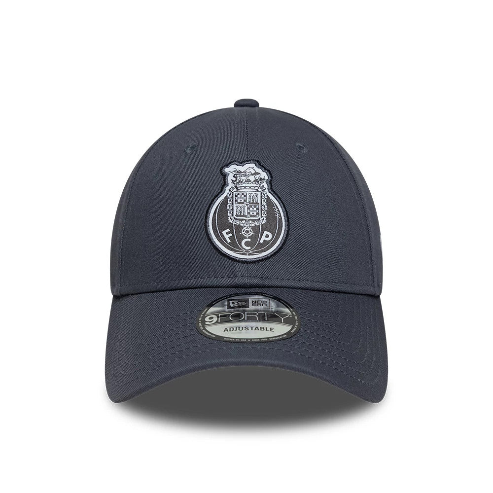 FC Porto Grey New Era 9FORTY Adjustable Cap, front view showing a raised white and grey embroidered FC Porto crest on the structured grey crown, a curved visor below, and a 9FORTY size sticker on the visor.