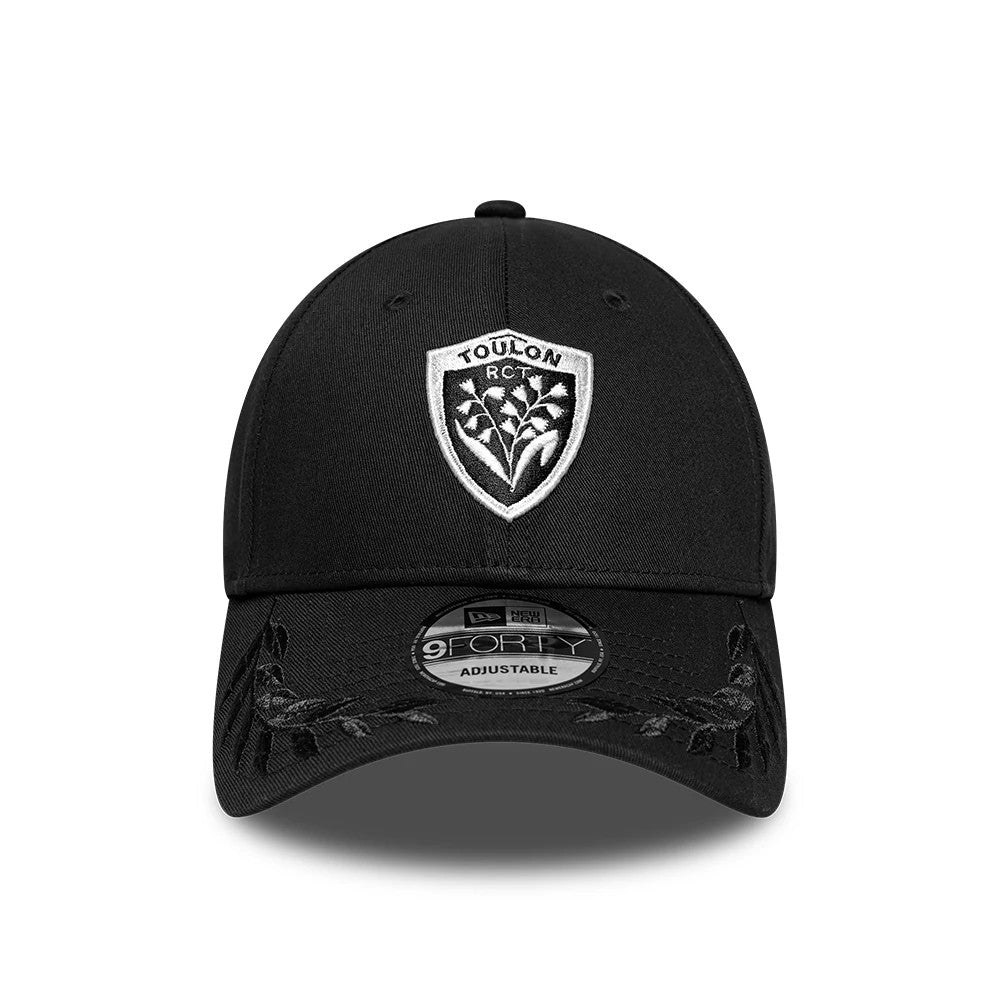 Rugby Club Toulon Cigales Black New Era 9FORTY Adjustable Cap, front view showing the white embroidered Toulon RCT logo on the front panel, black visor with floral embroidery, and the 9FORTY size sticker at the centre.