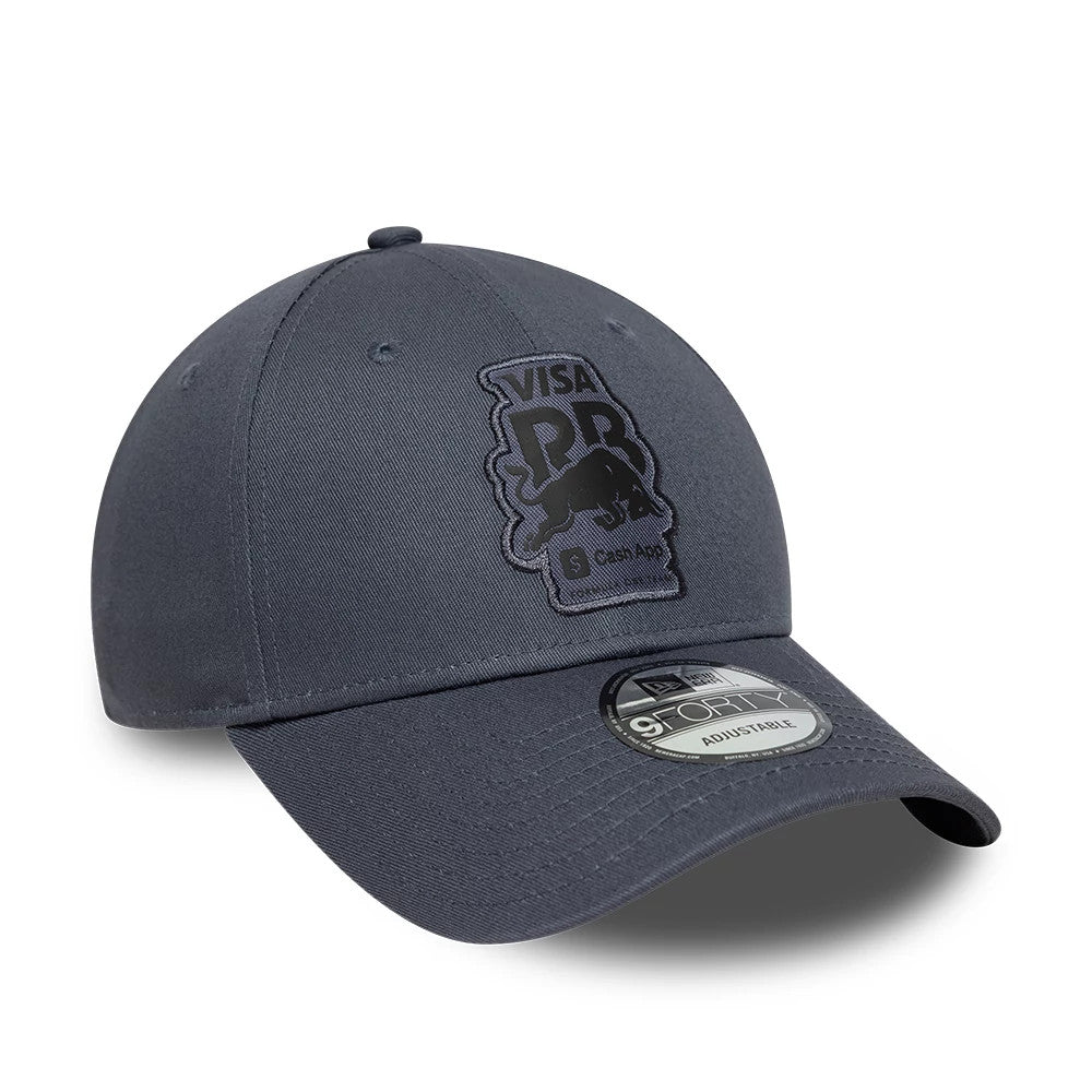 Visa Cash App Racing Bulls Grey New Era 9FORTY Adjustable Cap, front view showing a dark grey Visa logo with a bull graphic on the front panel, accompanied by a 9FORTY size sticker on the curved grey visor.