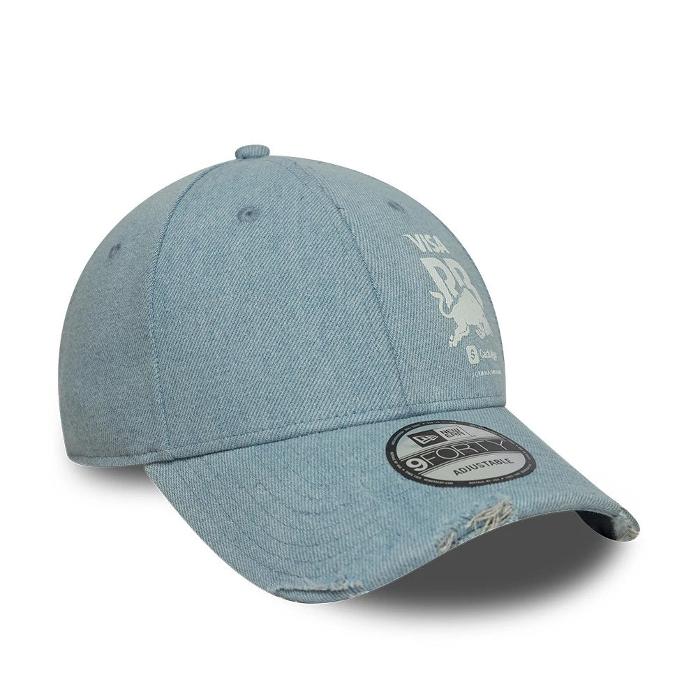 Visa Cash App Racing Bulls Denim Open Blue New Era 9FORTY Adjustable Cap, three-quarter view showing the white Visa and Bull graphics on the distressed light blue denim front panels, curved blue visor and a 9FORTY size sticker on the top.
