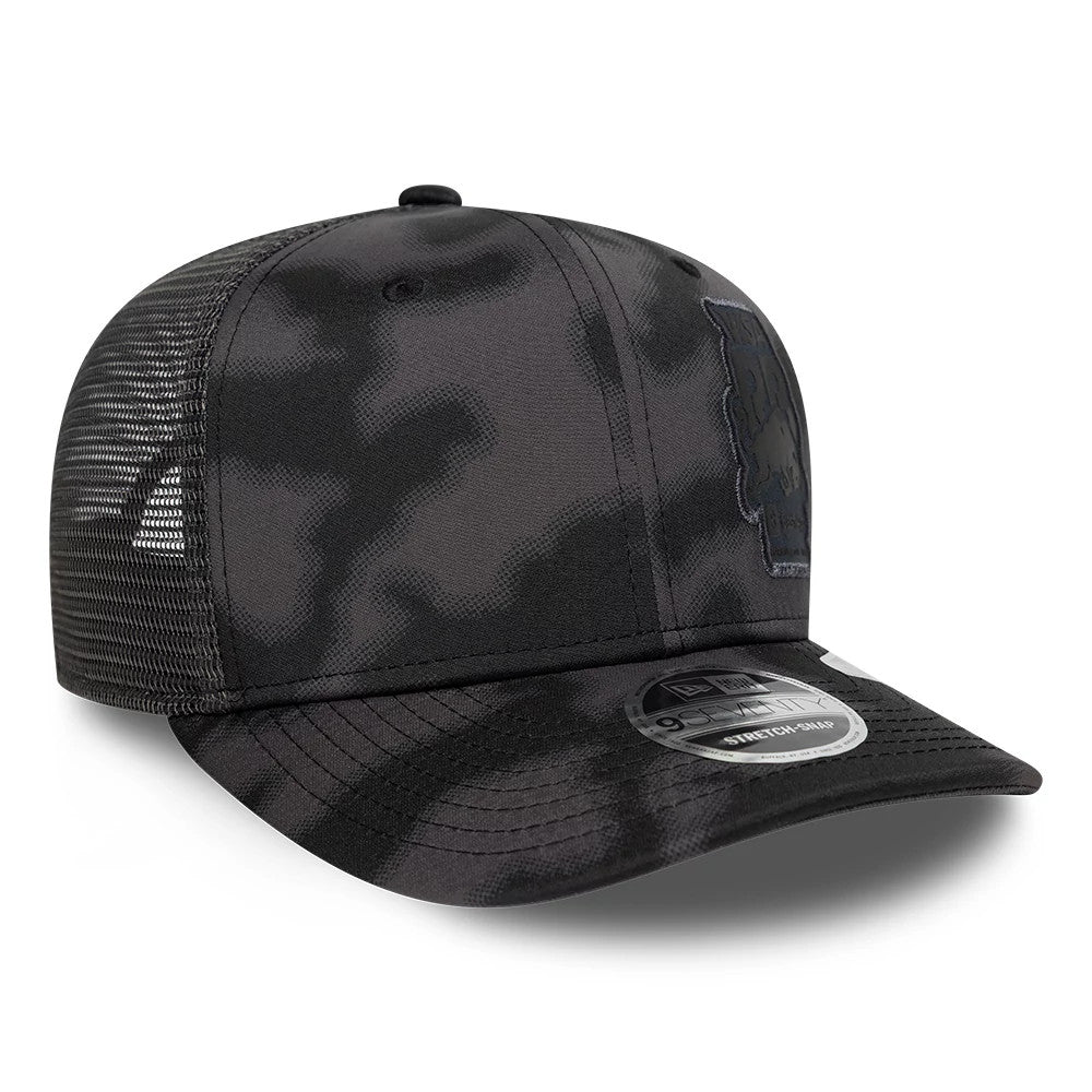 Visa Cash App Racing Bulls All Over Black New Era 9SEVENTY Stretch Snap Adjustable Cap, three-quarter view showing the black-on-black embroidered Racing Bulls logo on the front panel, curved black visor with a 9SEVENTY size sticker.