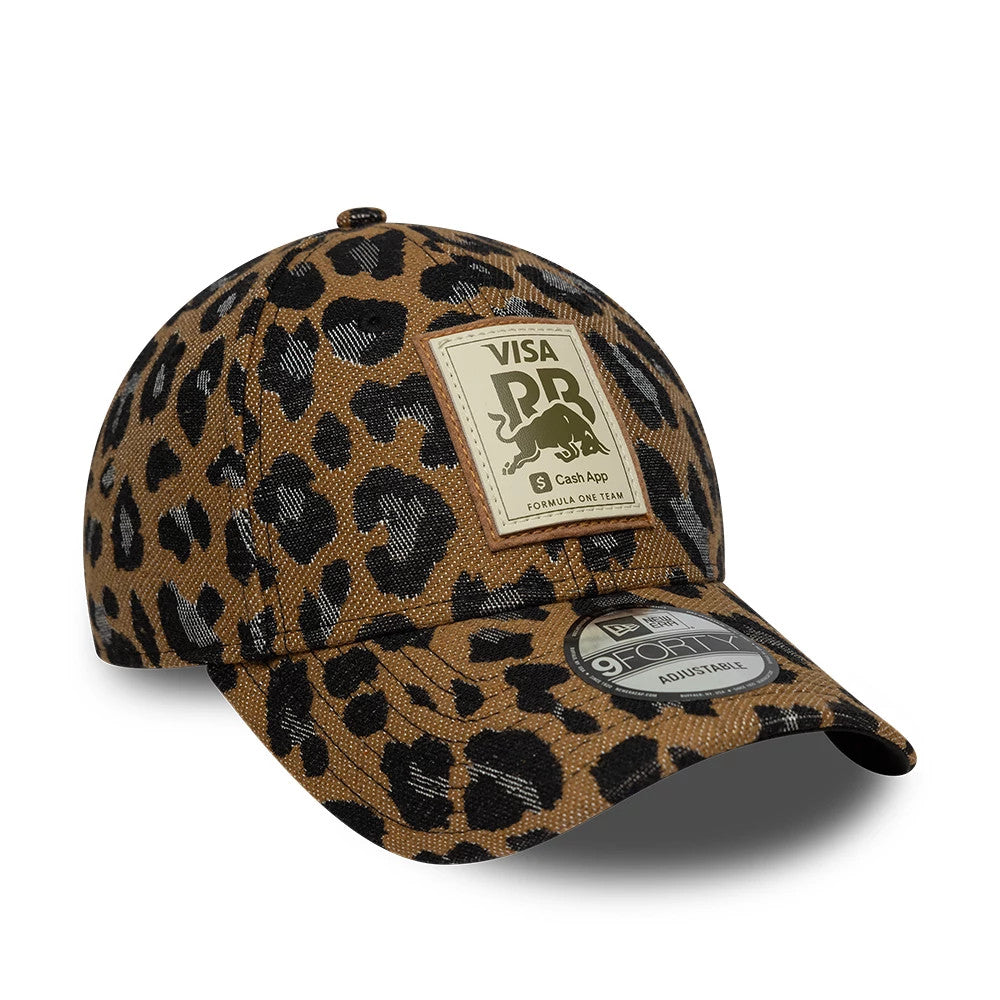 Womens Visa Cash App Racing Bulls Leopard Open Brown New Era 9FORTY Adjustable Cap, three-quarter view showing a large front patch with Visa and bull graphics, black leopard print pattern on the brown crown.