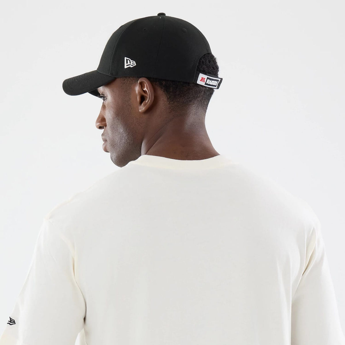 The model is wearing this NFL Sport Classic Las Vegas Raiders T-Shirt in cream. 7