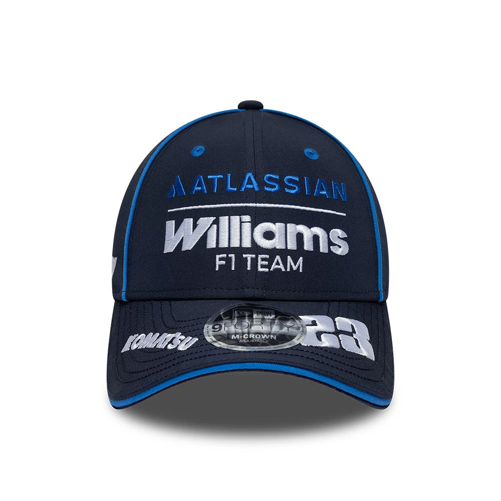 Williams Alex Albon Navy New Era 9FORTY M-Crown Adjustable Cap, front view showing raised white Williams F1 Team logo embroidery with Atlassian above it on the structured navy crown, and a grey 9FORTY size sticker on the curved visor.