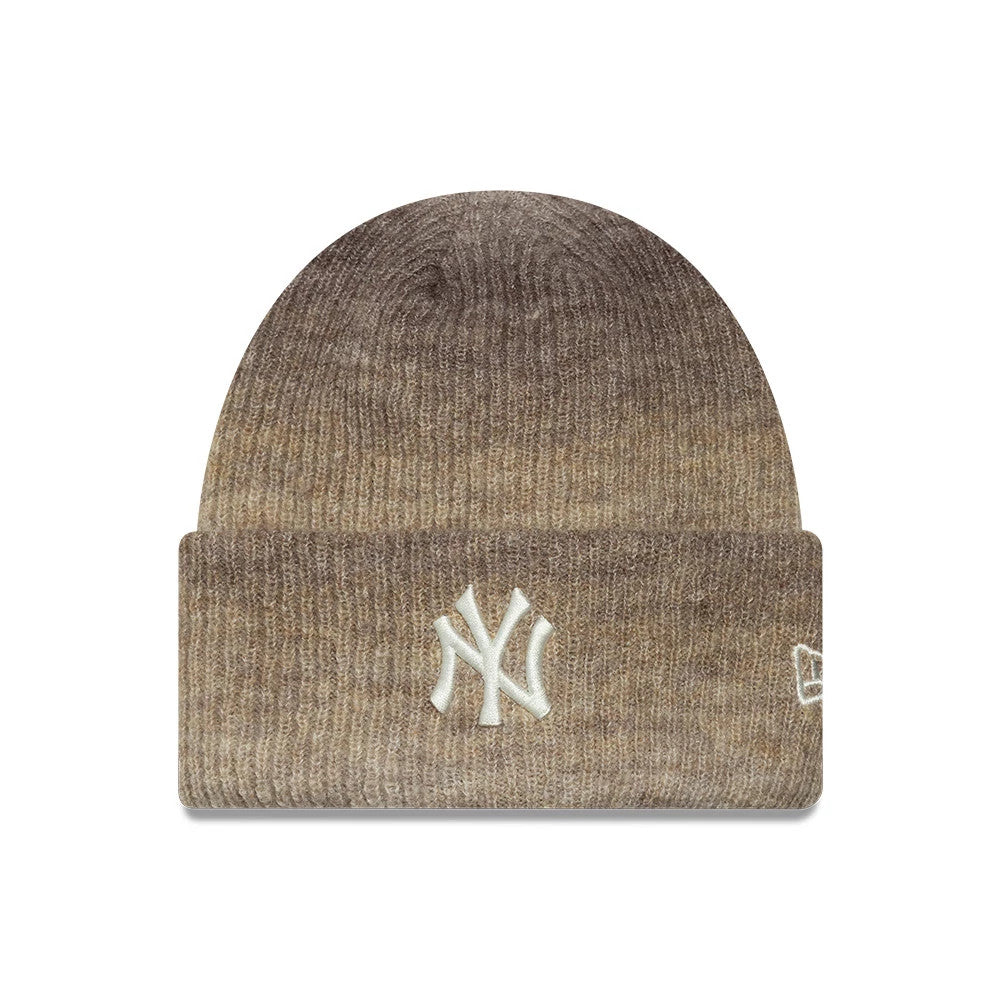 New Era New York Yankees Womens MLB Ombre Brown Cuff Knit Beanie Hat, front view showing a raised embroidered white NY logo on the folded cuff, with an ombre effect transitioning from dark brown at the top to light brown at the bottom.