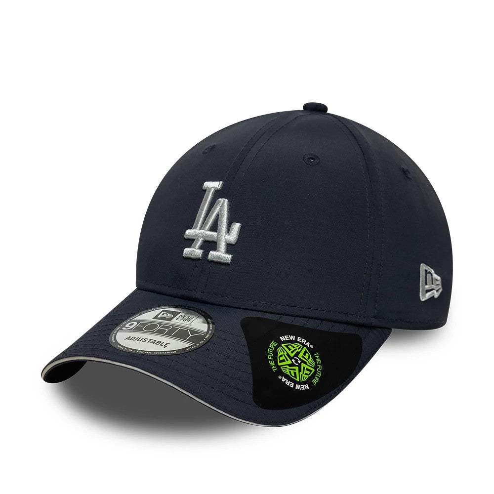 LA Dodgers MLB Recycled Navy New Era 9FORTY Adjustable Cap, front view showing the raised silver LA logo on the structured navy crown, black curved visor with a 9FORTY size sticker, and New Era flag logo on the left side.