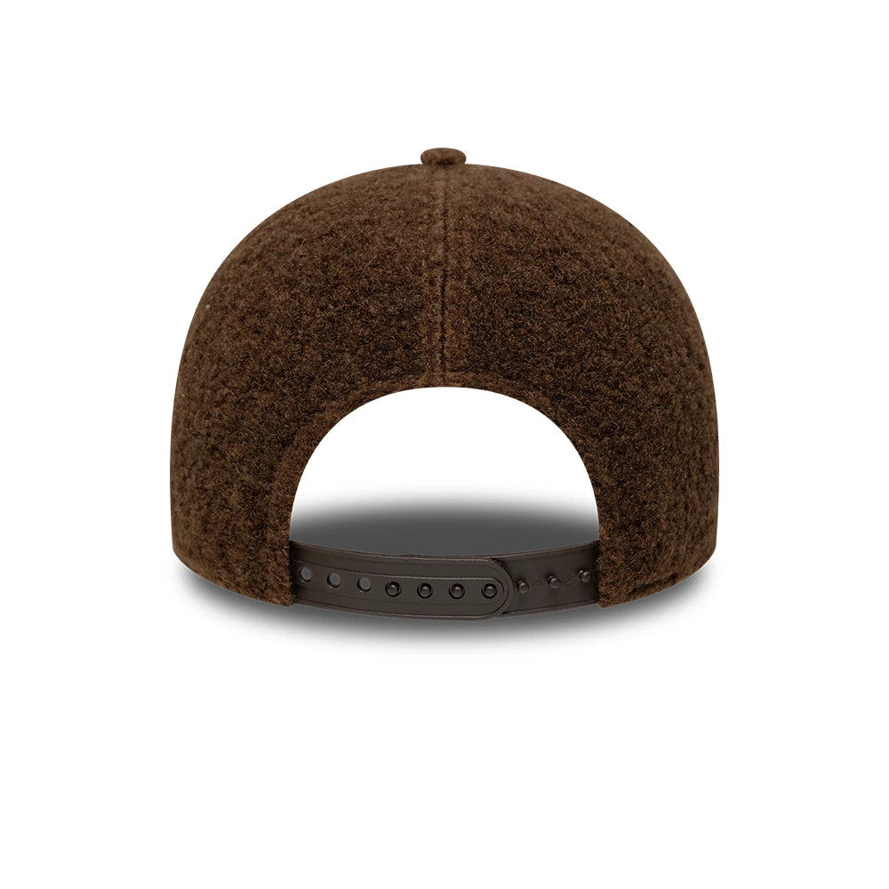New York Yankees MLB Winter Borg Brown New Era 9FORTY Adjustable Cap, rear view showing the textured brown borg material on the crown, a brown adjustable strap with snap fasteners, and a seamless connection at the back panels.