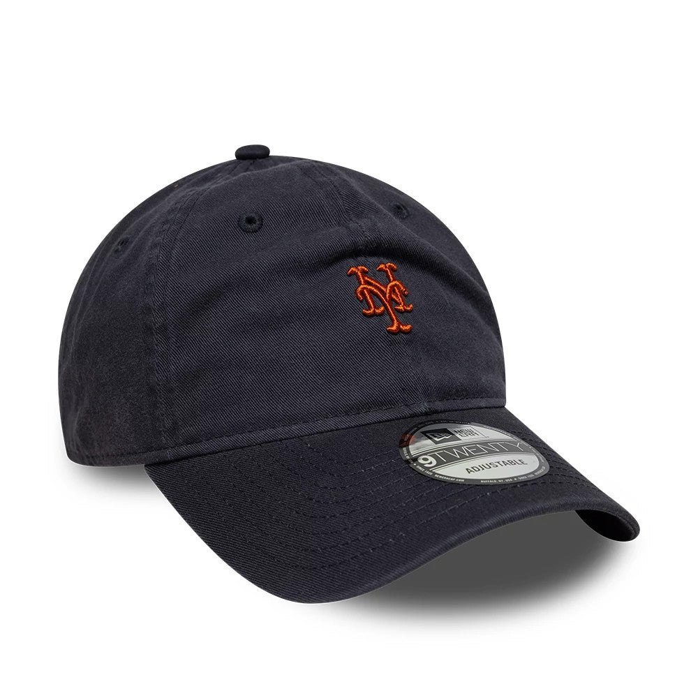 New York Mets MLB Mini Logo Navy New Era 9TWENTY Adjustable Cap, three-quarter view showing the orange embroidered Mets logo on the front panel, a curved black visor, and the 9TWENTY size sticker on the top of the visor.