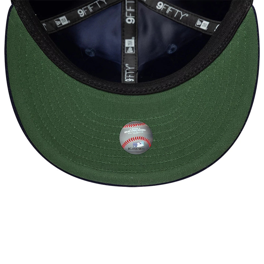 New York Yankees MLB Heritage Navy Retro Crown New Era 9FIFTY Adjustable Cap, inside view showing the green undervisor with a baseball design sticker, black sweatband with white New Era branding, and 9FIFTY taping on the inside.