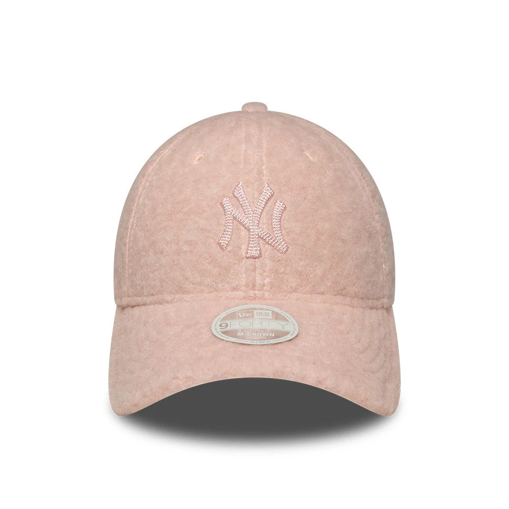 Yankees Womens MLB Winter Borg Pastel Pink New Era 9FORTY M-Crown Adjustable Cap, front view showing the pink embroidered NY logo on the structured pastel pink borg crown, with a curved visor and a 9FORTY size sticker on the visor.