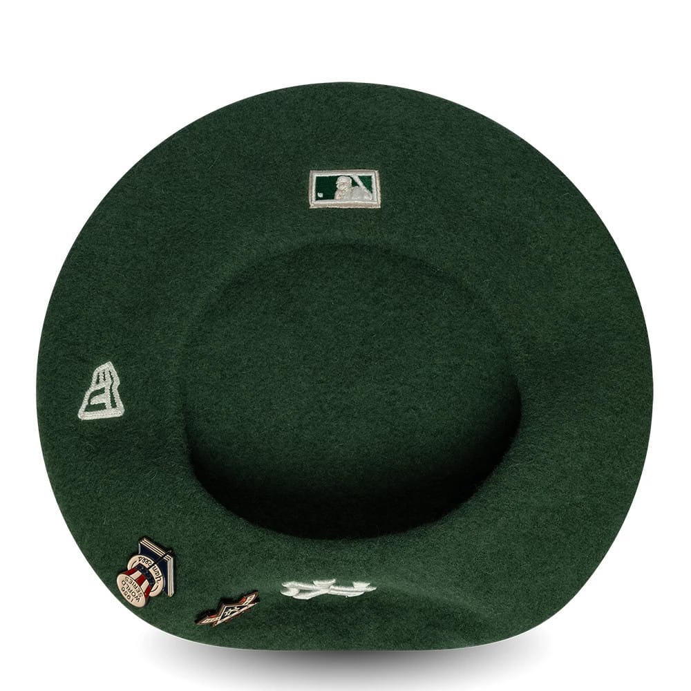 Pictured is this MLB Cooperstown Pin New York Yankees Beret in dark green. 5