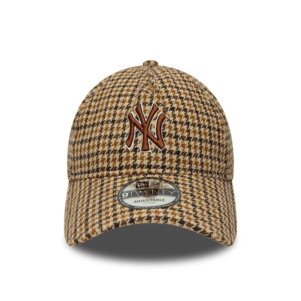 Pictured is this MLB Check New York Yankees 9TWENTY A-Frame cap in beige. 2