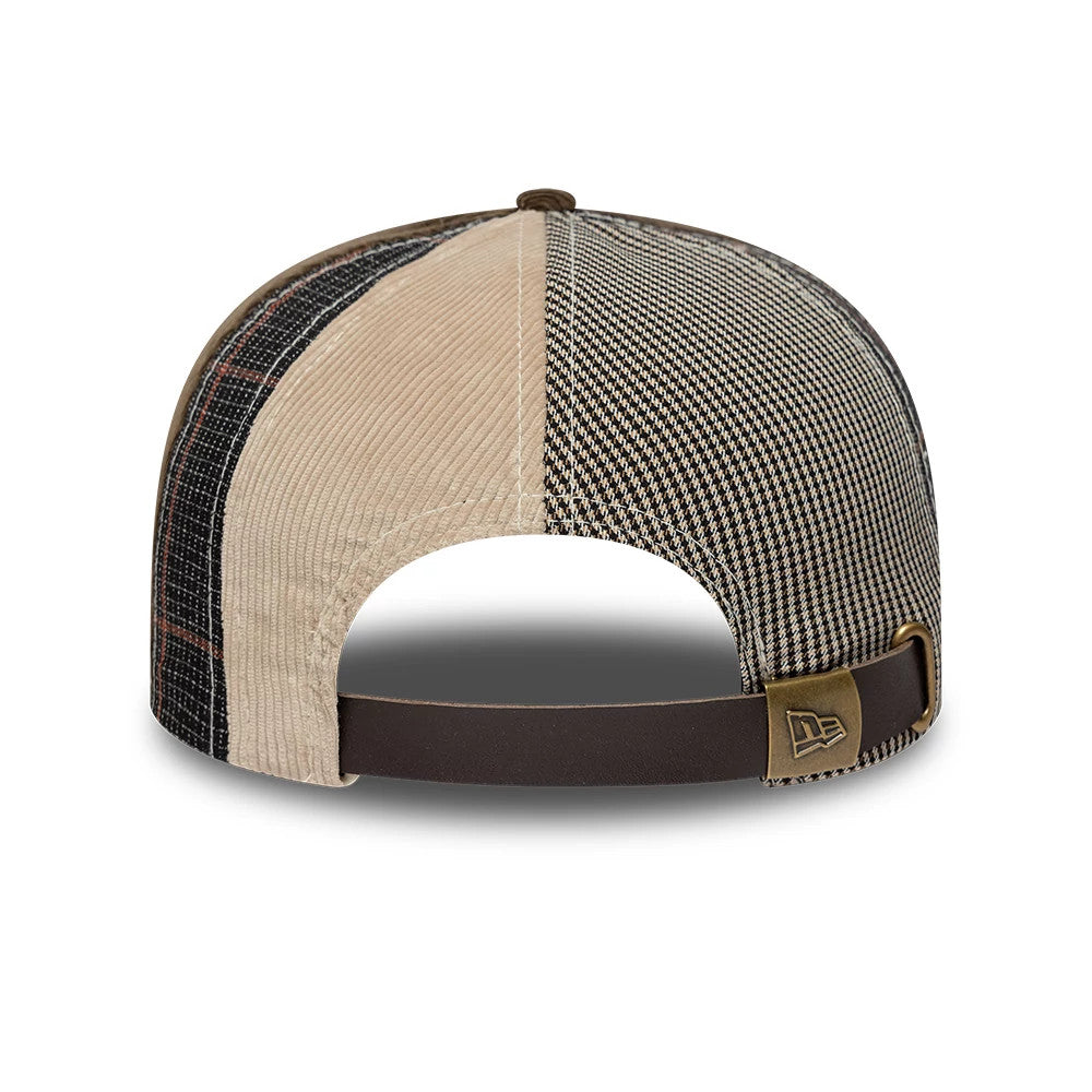 Yankees MLB Patchwork Dark Brown Retro Crown New Era 9FIFTY Adjustable Cap, rear view showing a variety of textured fabric panels in dark brown, tan, and check patterns, with a brown adjustable strap and New Era flag logo patch on the right side.