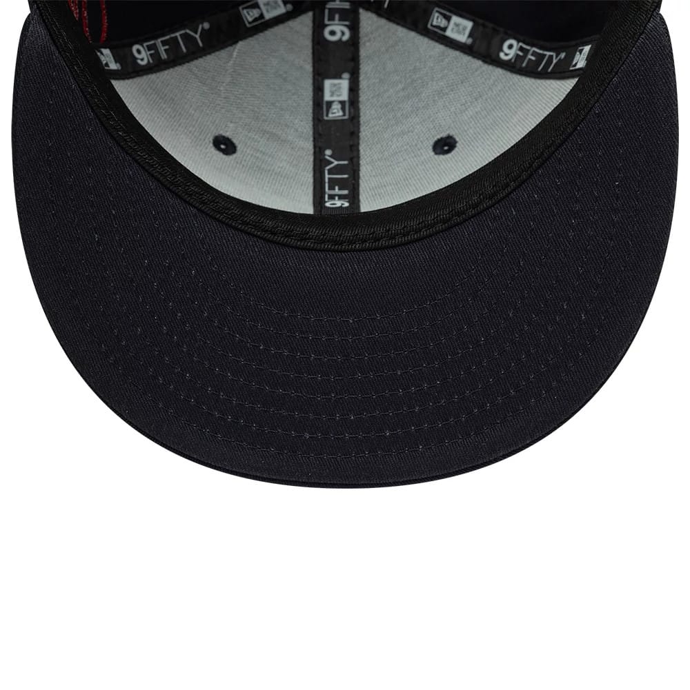 Pictured is this Youth MLB Dino 9FIFTY Snapback cap in navy. 7