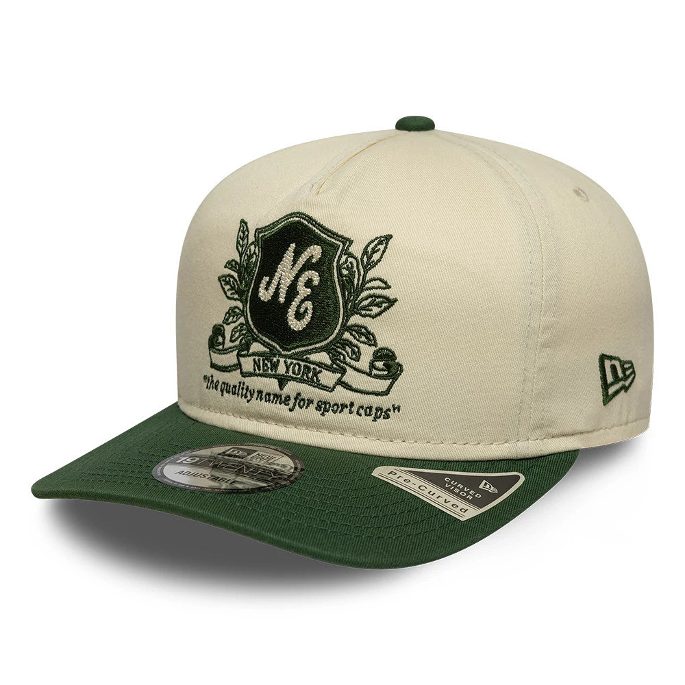 Pictured is this New Era Washed Graphic 19TWENTY cap in cream & green. 1