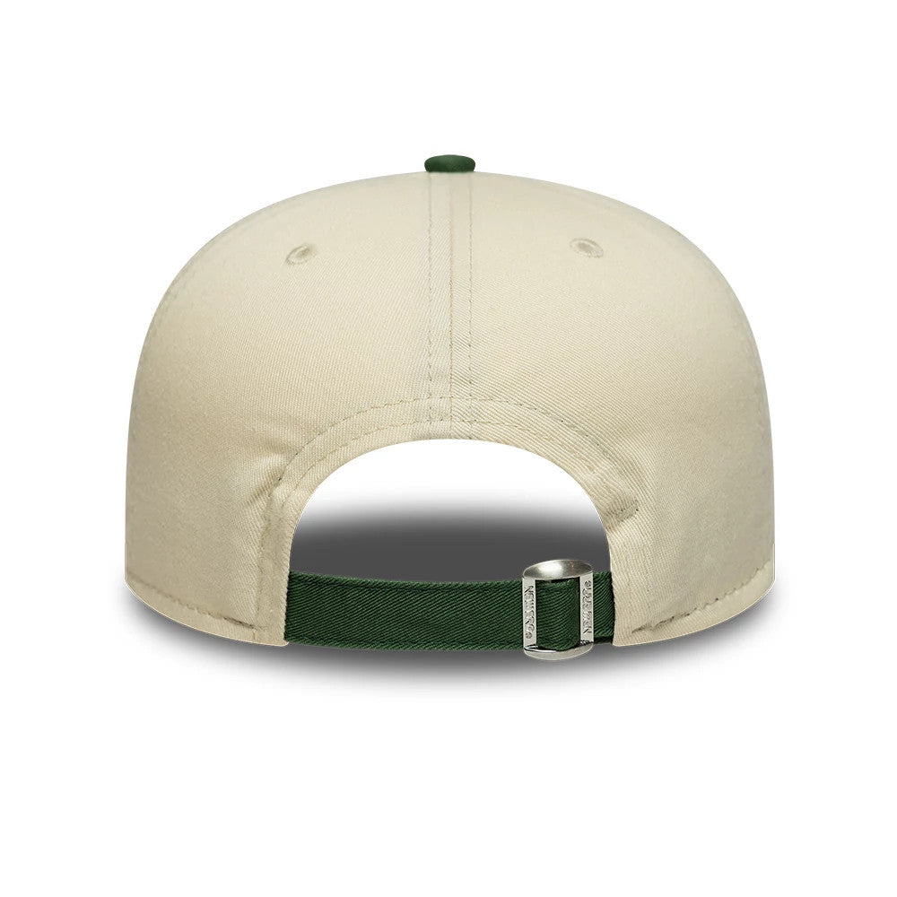 Pictured is this New Era Washed Graphic 19TWENTY cap in cream & green. 4