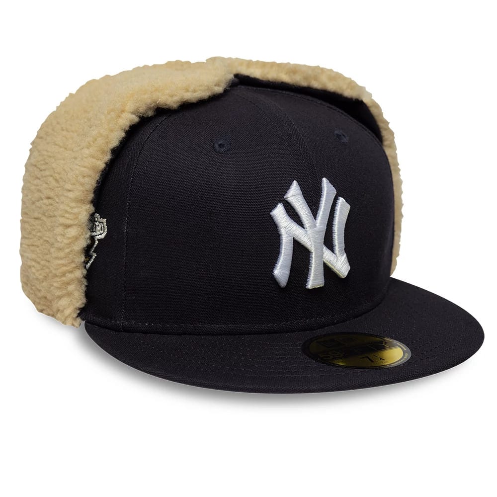 Pictured is this MLB World Series New York Yankees Dogear 59FIFTY Fitted cap in navy. 1