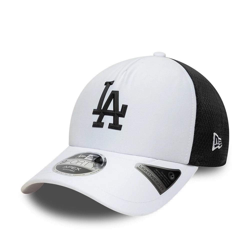 LA Dodgers MLB Sporty White New Era 9FORTY Apex Adjustable Cap, three-quarter view showing the raised black LA logo embroidered on the white front panels, contrasted by the black mesh side panels, with a 9FORTY size sticker on the white curved visor.