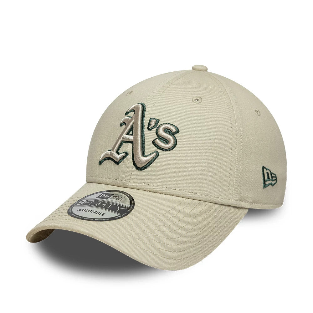 Athletics MLB Team Outline Cream New Era 9FORTY Adjustable Cap, three-quarter view showing the raised green and cream A's logo embroidered on the front panel, a matching cream curved visor with a 9FORTY size sticker.