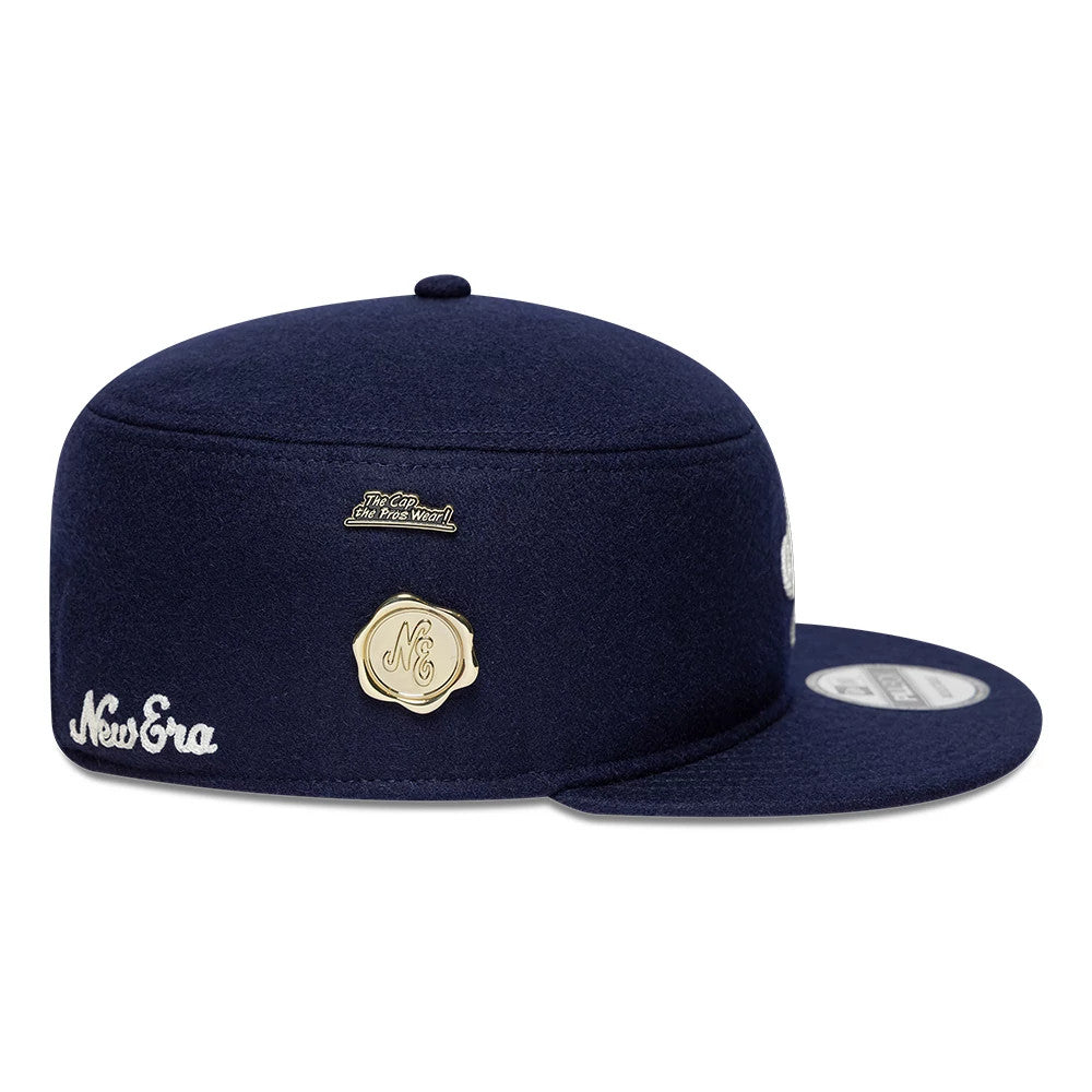 Pictured is this New Era Pin Pillbox Adjustable cap in navy. 4