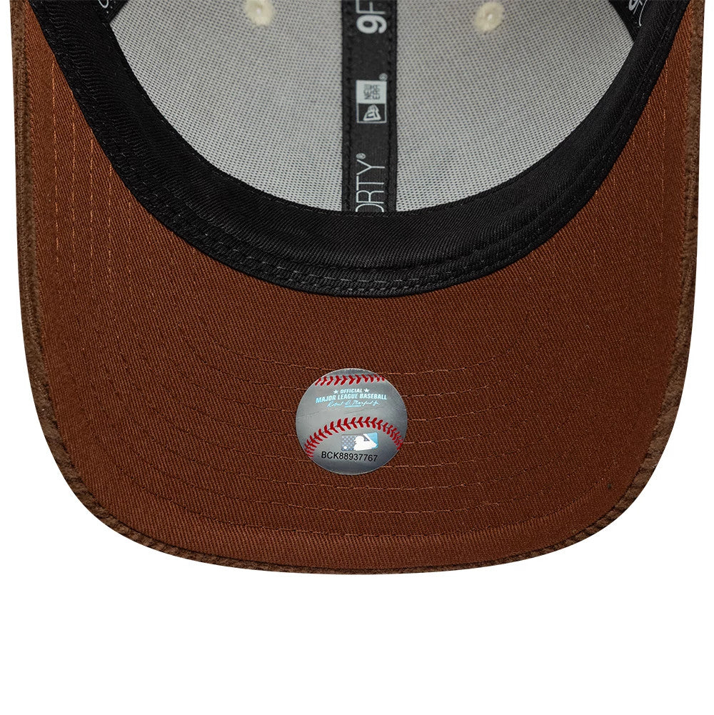New York Yankees MLB Cord Cream & Brown New Era 9FORTY M-Crown Adjustable Cap, inside view showing the black undervisor, contrasting grey sweatband with New Era and 9FORTY taping, and an MLB holographic sticker on the brown fabric.