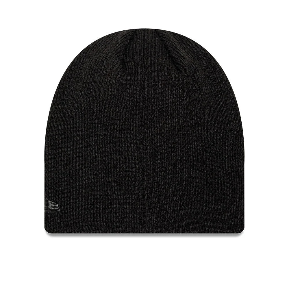 New Era Script Black Skull Knit Beanie Hat, front view showing a simple black ribbed knit texture, a rounded crown with a black top button, and a small New Era flag logo embroidered in grey on the left side near the base.