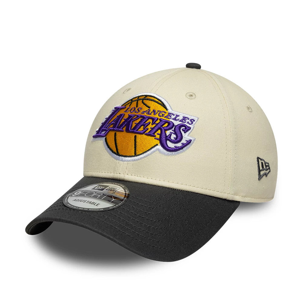 Pictured is this NBA Colourblock LA Lakers 9FORTY cap in cream & black. 1