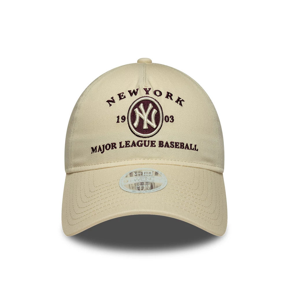 New York Yankees Womens MLB Cream New Era 9TWENTY A-Frame Adjustable Cap, front view showing the maroon embroidered New York Yankees logo on the cream crown with additional text, curved cream visor and 9TWENTY size sticker on the visor.