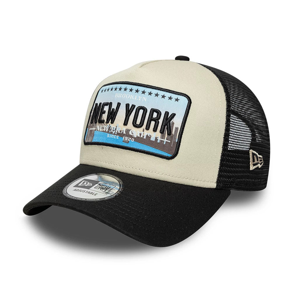 Pictured is this New Era Licence Plate 9FORTY A-Frame Trucker cap in black. 1