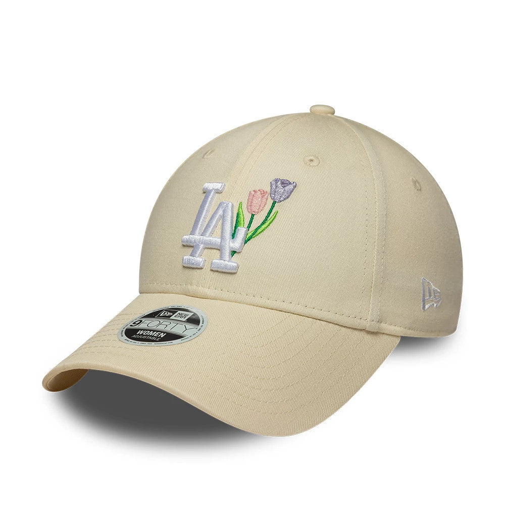 LA Dodgers Womens MLB Flower Icon Cream New Era 9FORTY Adjustable Cap, front view showing the white embroidered LA logo with purple and pink flower details on the cream front panel, curved visor, and 9FORTY size sticker on the visor.