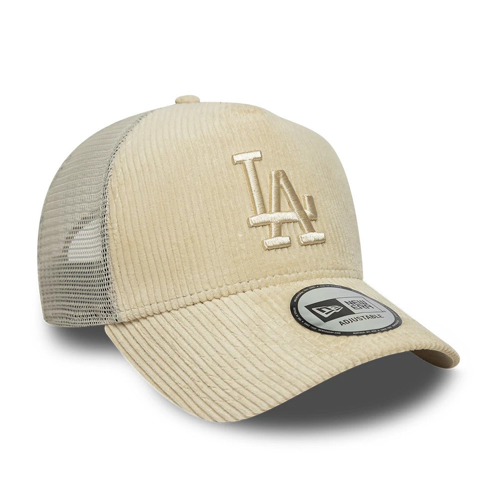 LA Dodgers MLB Cord Cream New Era 9FORTY A-Frame Trucker Adjustable Cap, three-quarter view showing the cream embroidered LA logo on the front panel, a matching cream curved visor with a 9FORTY size sticker, and a mesh rear section.