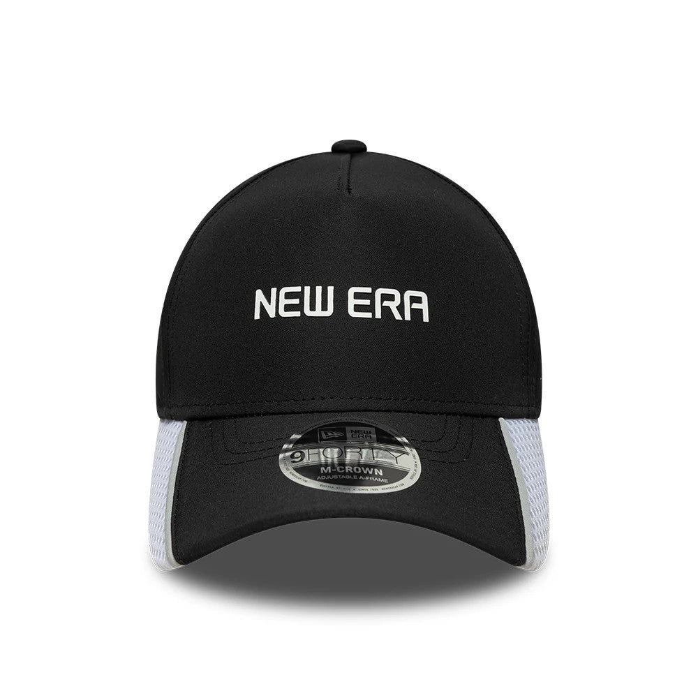 New Era Tech Black 9FORTY M-Crown A-Frame Adjustable Cap, front view showing a white embroidered New Era logo on the black structured crown, strong A-frame shape, black curved visor and 9FORTY size sticker on the visor.